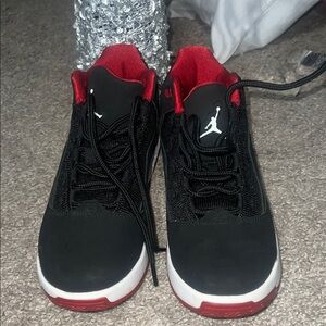 Jordan big kids Black and Red Sneakers with White Soles
